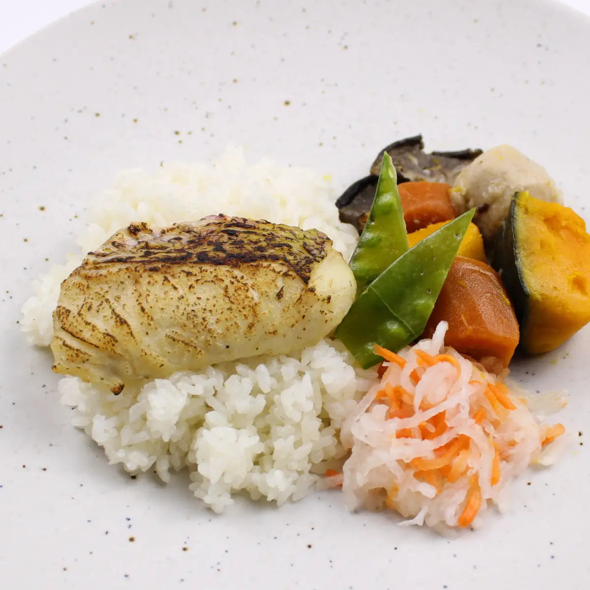 Grilled snapper over seasoned rice